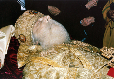 The reposed Clairvoyant Archbishop Andrew in his casket. Fr. Isaac placed his numb arm on the holy archbishop and asked for forgiveness and healing.